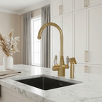 Modern kitchen with gold faucet and marble countertop