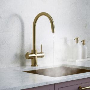 a brass swan neck boiling water tap