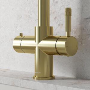Close-up of a champagne gold boiler tap handle