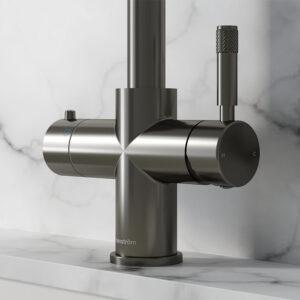 Close-up of a gunmetal grey boiler tap handle