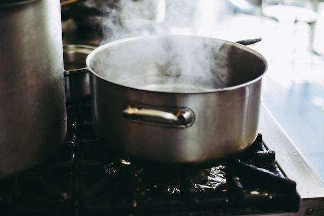 boiling water on a stainless steel pot