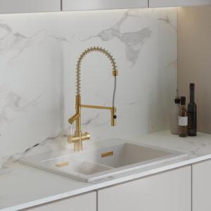 a gold instant boiling tap with flexible swivel spout