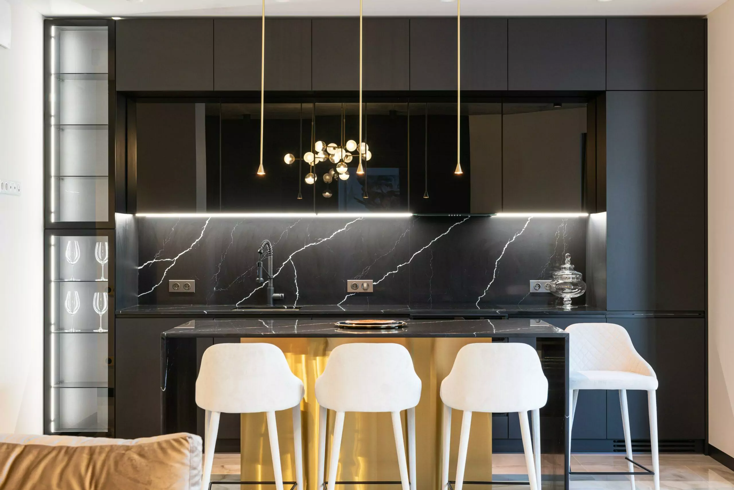 modern kitchen interior with black marble worktops